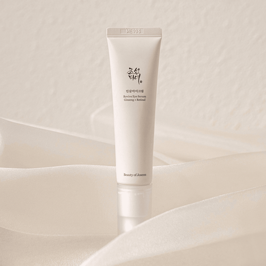 Beauty of Joseon Revive Eye Serum, Ginseng + Retinal, ivory tube on beige backdrop
