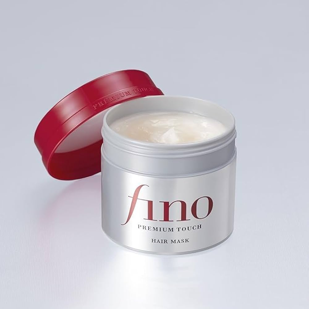 Fino Premium Touch Hair Mask by Originala with creamy texture, showcasing deep repair and intense moisture for damaged hair.